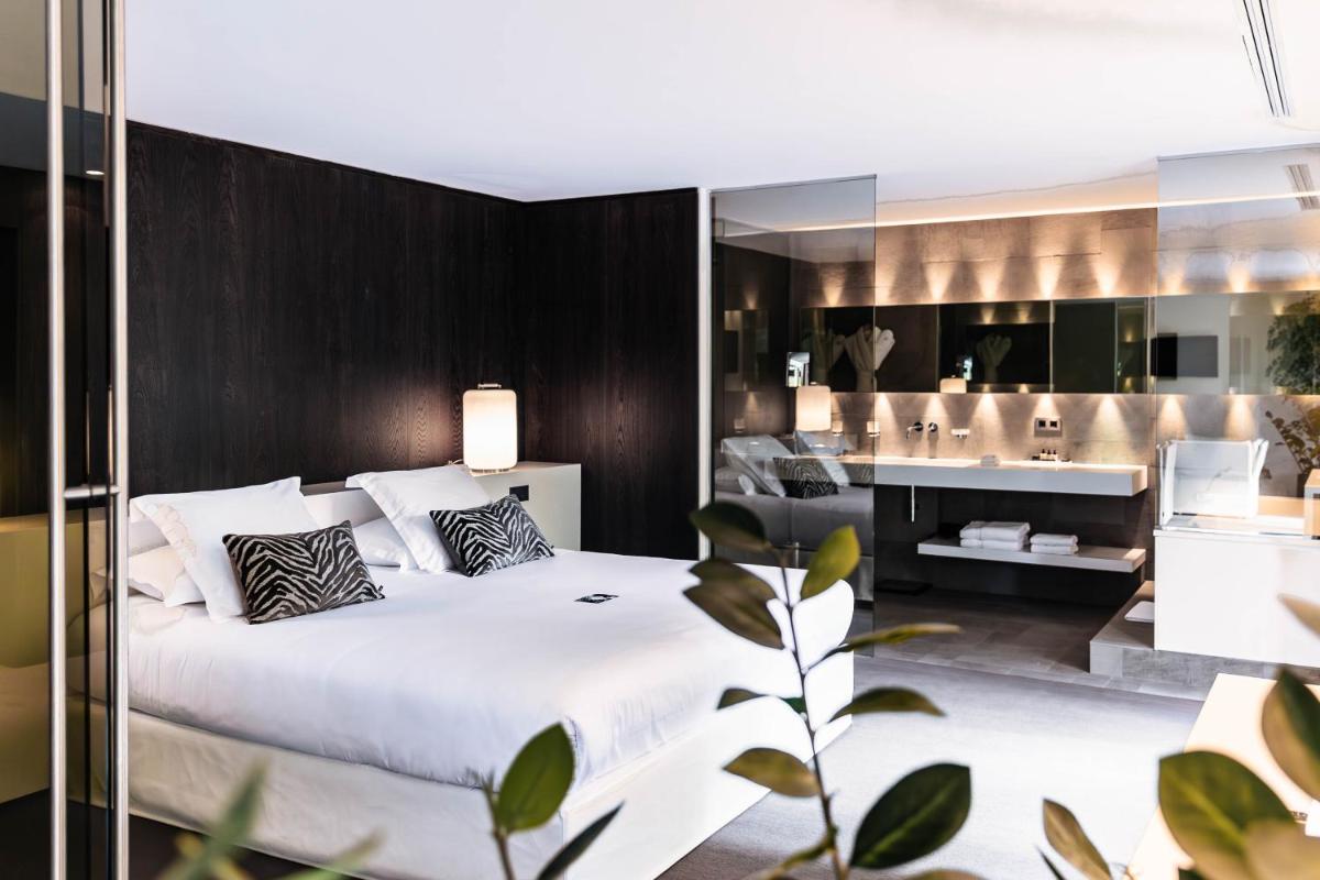 Un ou plusieurs lits dans un hébergement de l'établissement Bdesign & Spa