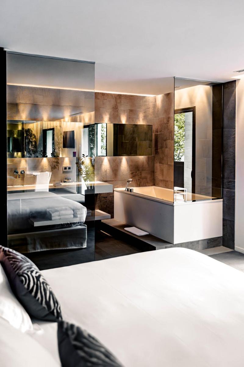 Un ou plusieurs lits dans un hébergement de l'établissement Bdesign & Spa
