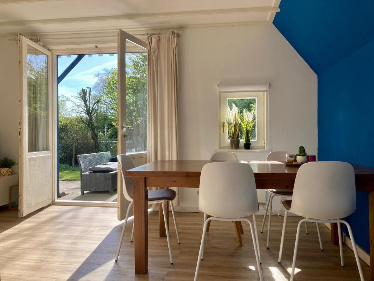 Grachthaus 6pers House with a private terrace and garden by the Lauwersmeer - Housity