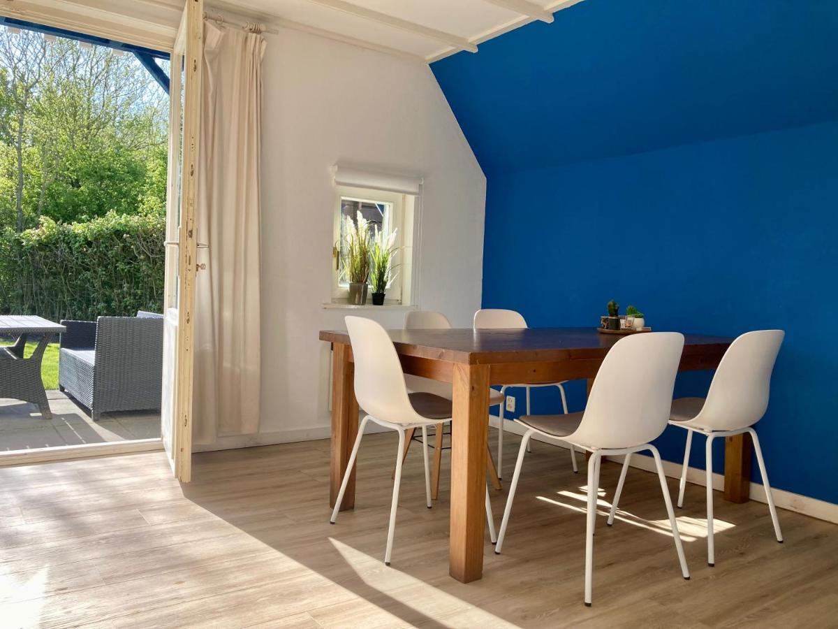 Grachthaus 6pers House with a private terrace and garden by the Lauwersmeer - Housity