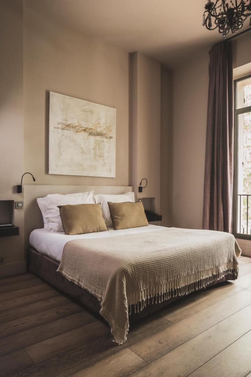 Un ou plusieurs lits dans un hébergement de l'établissement Les Lodges Sainte-Victoire Hotel & Spa