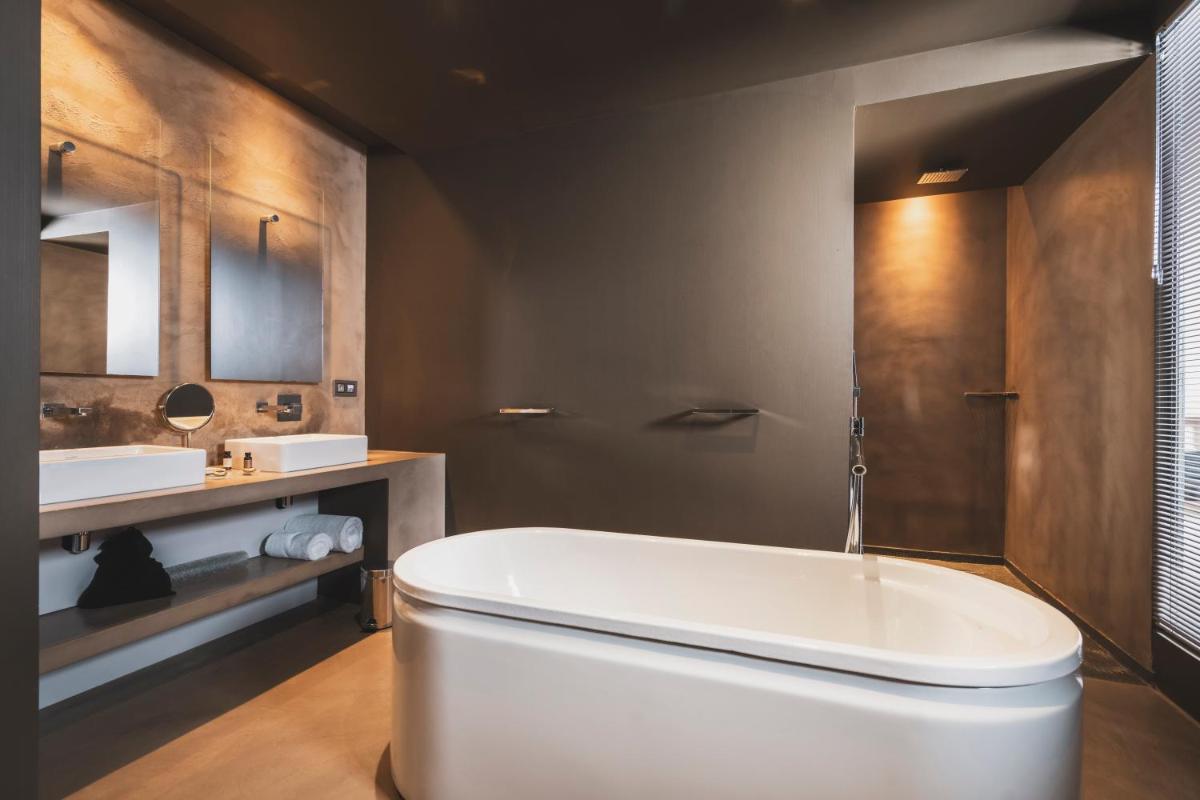 Salle de bains dans l'établissement Les Lodges Sainte-Victoire Hotel & Spa