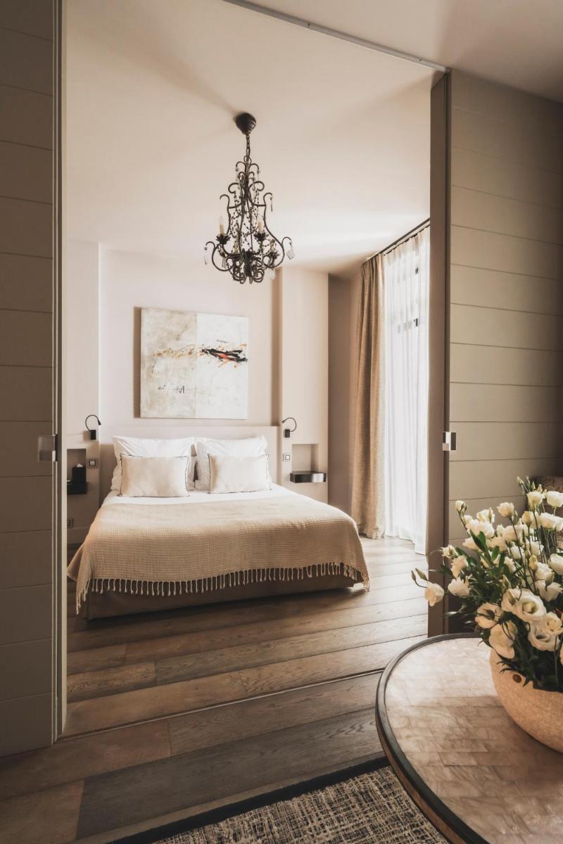 Un ou plusieurs lits dans un hébergement de l'établissement Les Lodges Sainte-Victoire Hotel & Spa