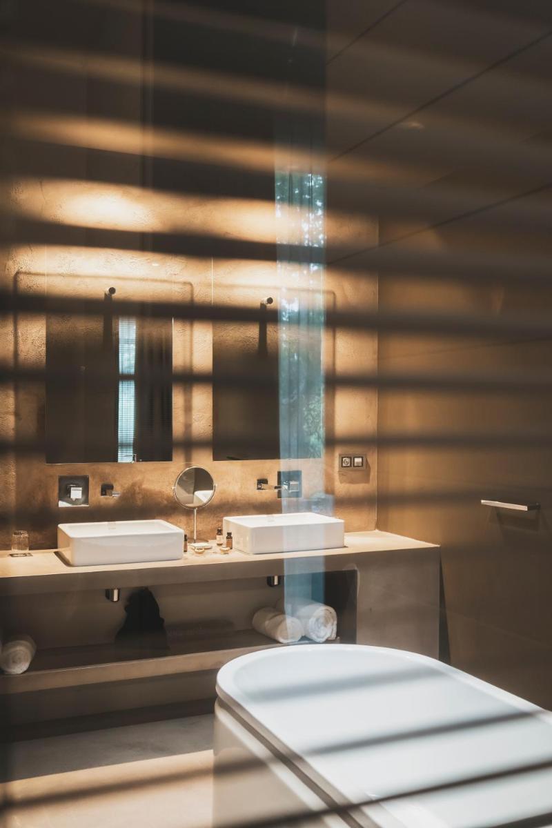 Salle de bains dans l'établissement Les Lodges Sainte-Victoire Hotel & Spa