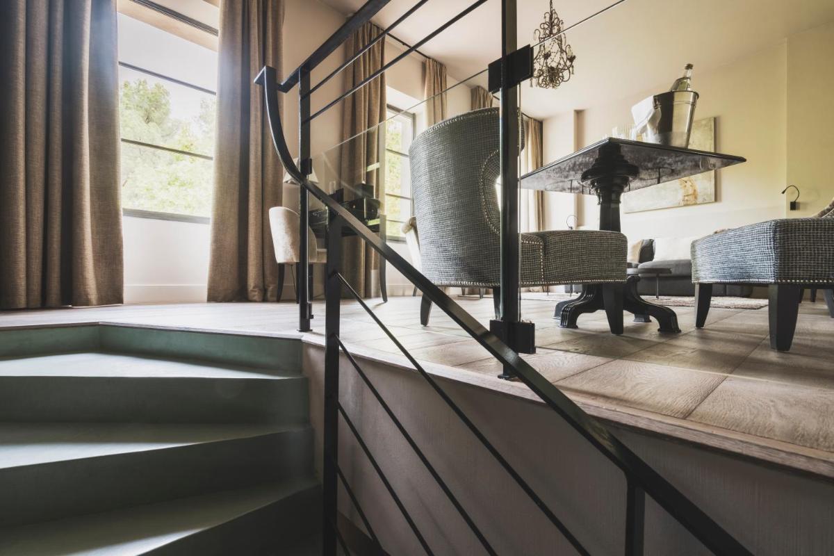 Un ou plusieurs lits dans un hébergement de l'établissement Les Lodges Sainte-Victoire Hotel & Spa