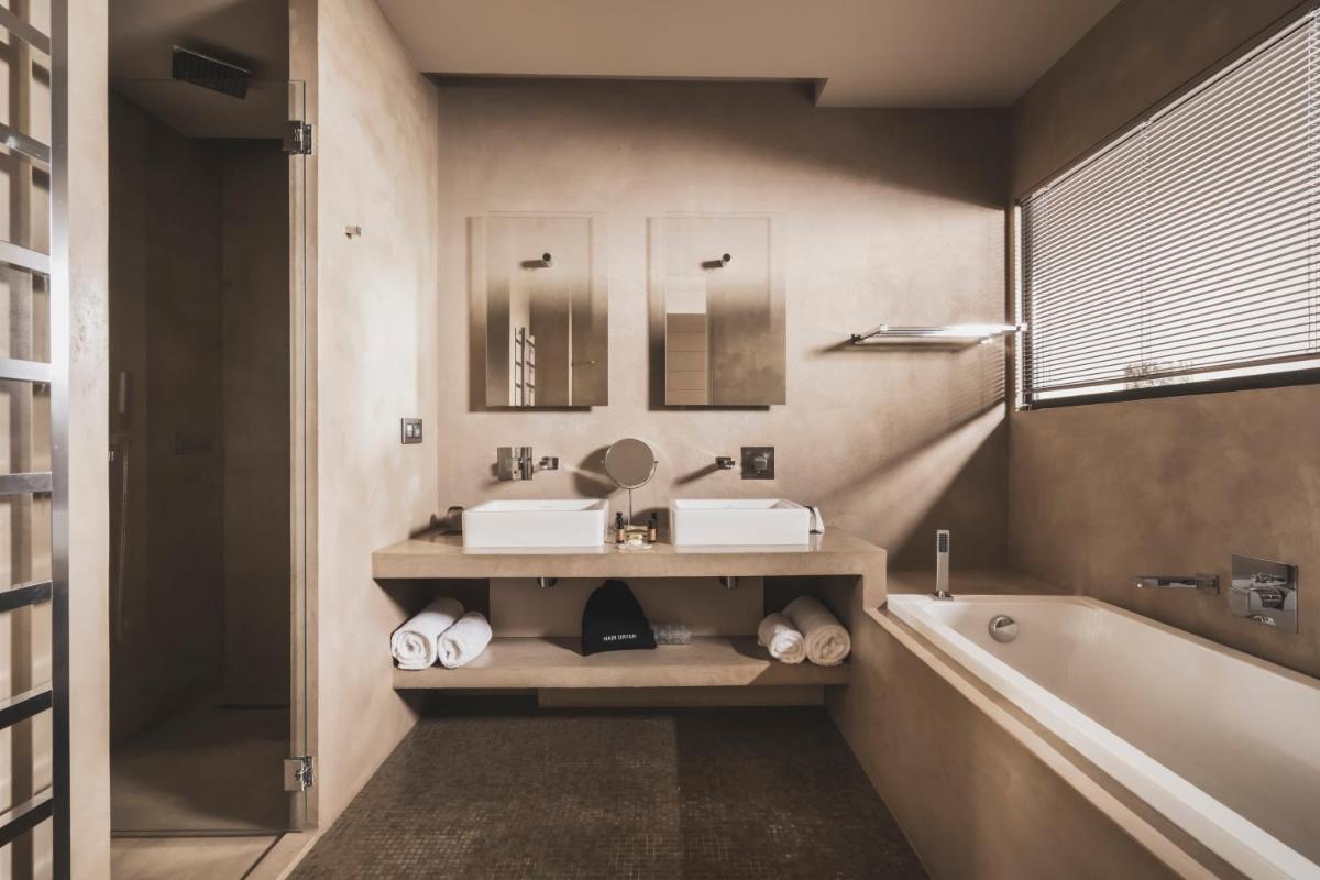 Salle de bains dans l'établissement Les Lodges Sainte-Victoire Hotel & Spa