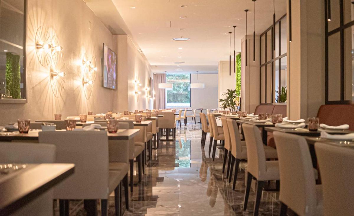 Um restaurante ou outro lugar para comer em MASA Hotel & Spa Campo Grande Collection