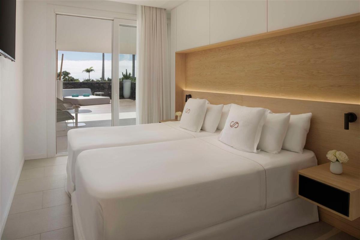 Cama o camas de una habitación en Royal Hideaway Corales Suites