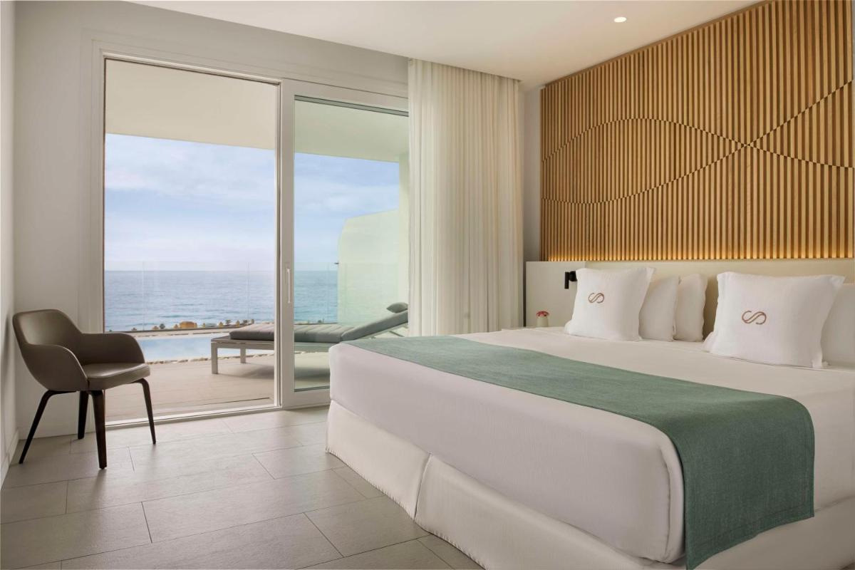 Cama o camas de una habitación en Royal Hideaway Corales Suites
