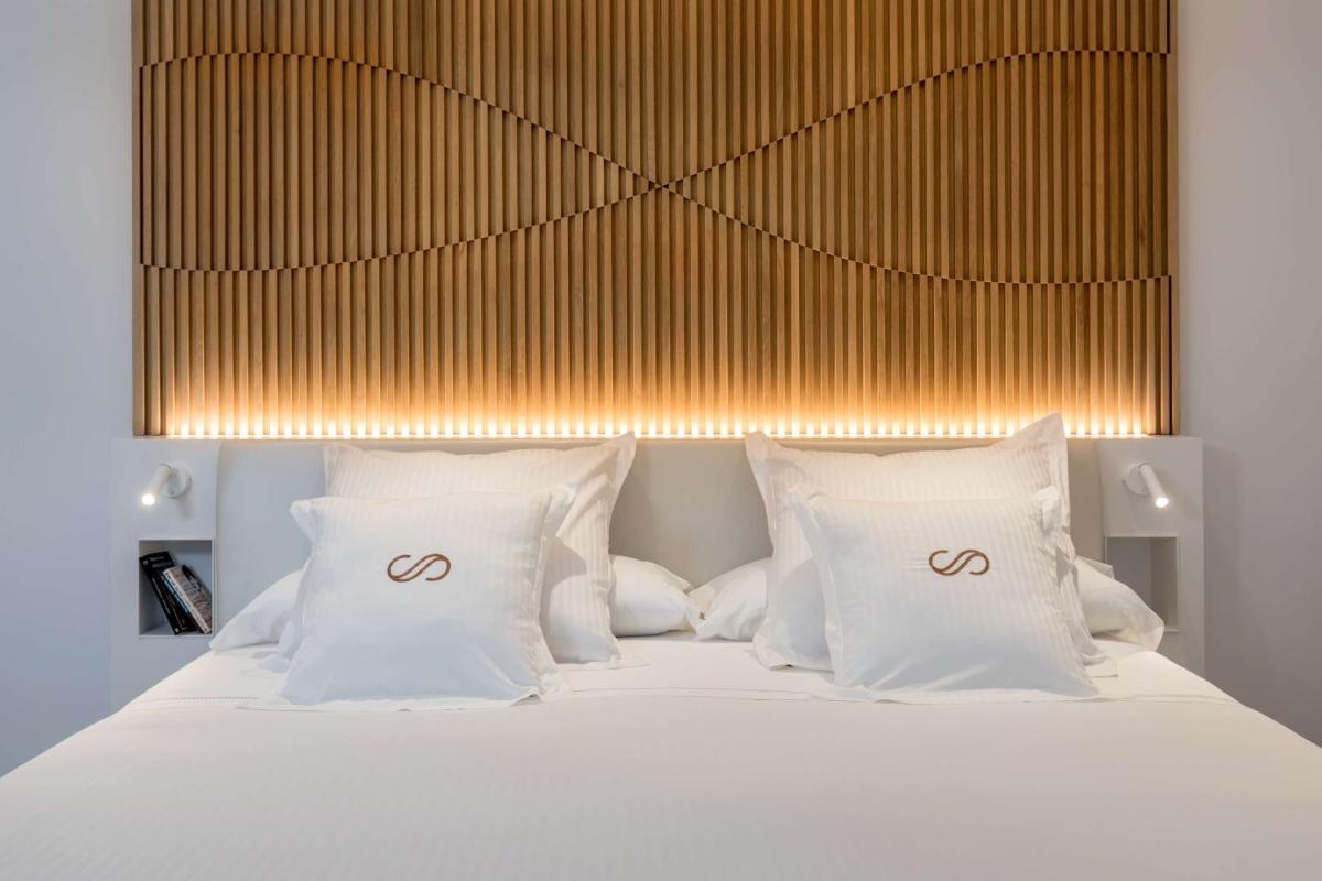 Cama o camas de una habitación en Royal Hideaway Corales Suites
