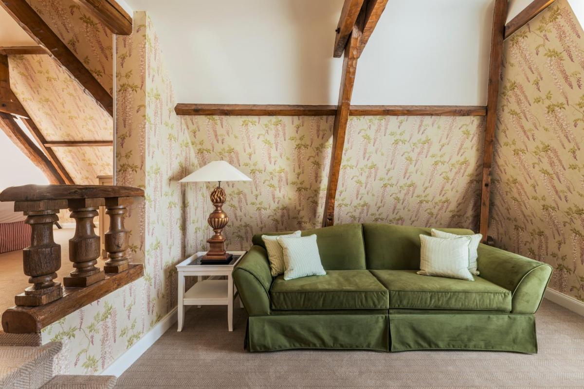 Coin salon dans l'établissement Les Hauts de Loire Relais & Châteaux