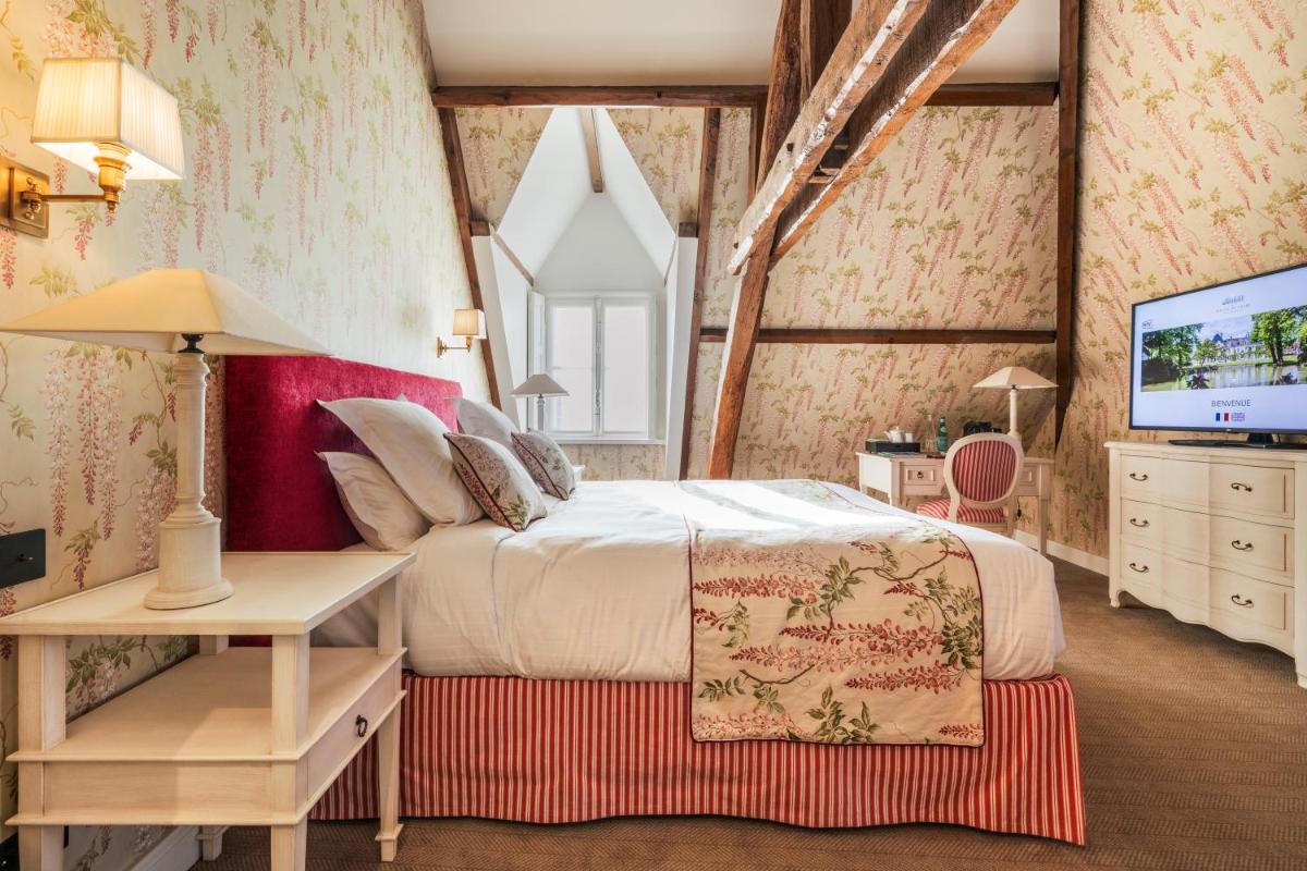Un ou plusieurs lits dans un hébergement de l'établissement Les Hauts de Loire Relais & Châteaux