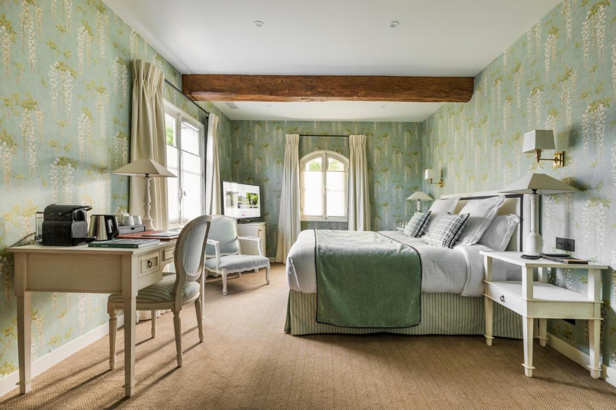 Un ou plusieurs lits dans un hébergement de l'établissement Les Hauts de Loire Relais & Châteaux