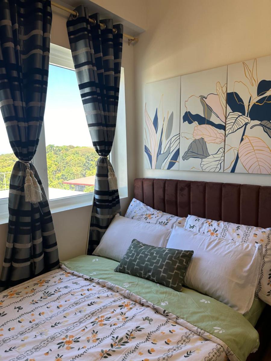 Condo near SM Fairview - Housity