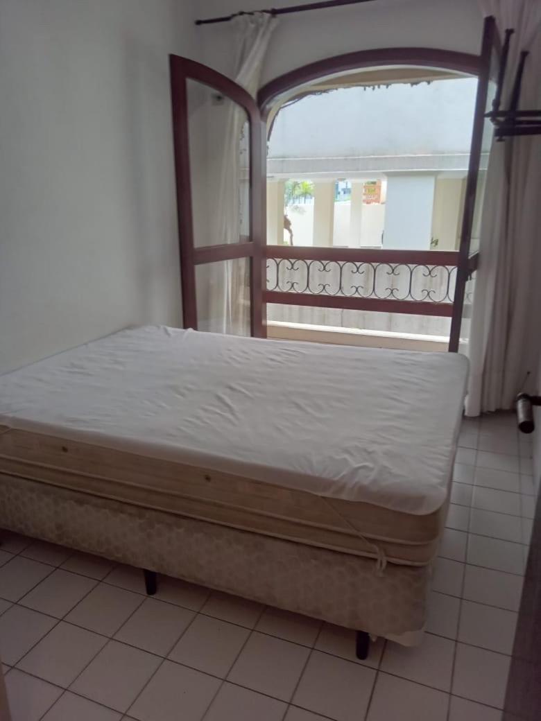 40 Metros da Praia da Enseada, apartamento Pé na Areia na MELHOR praia do Guaruja - SP - Housity