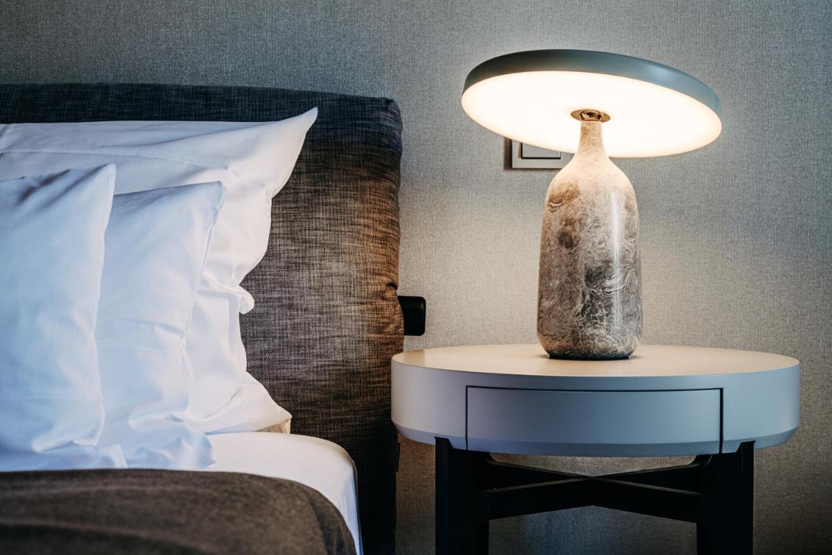 Ein Bett oder Betten in einem Zimmer der Unterkunft Söl'ring Hof