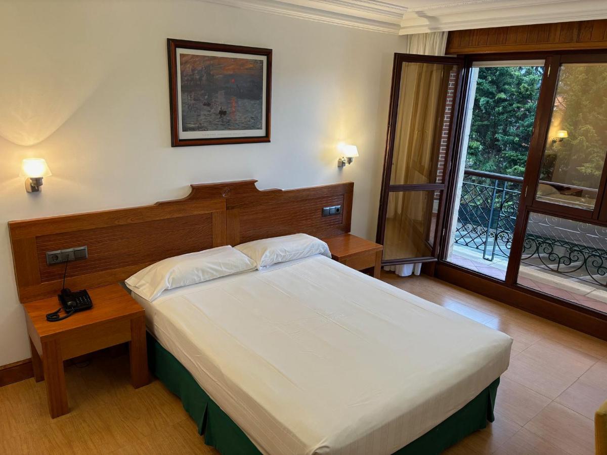 Cama o camas de una habitación en Gran Hotel Liber & Spa Playa Golf