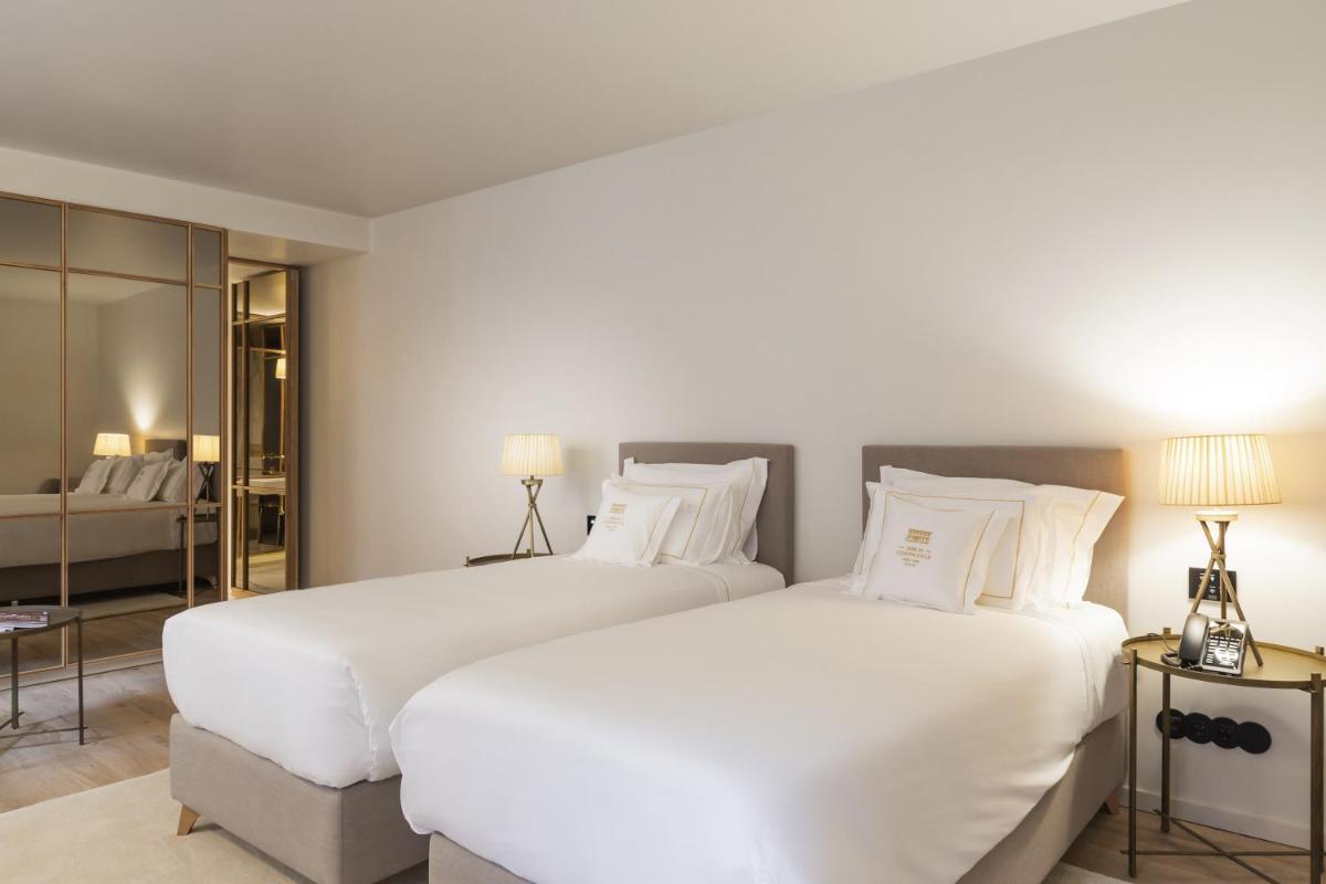 Uma cama ou camas num quarto em Casa da Companhia Hotel & Spa, Vignette Collection by IHG