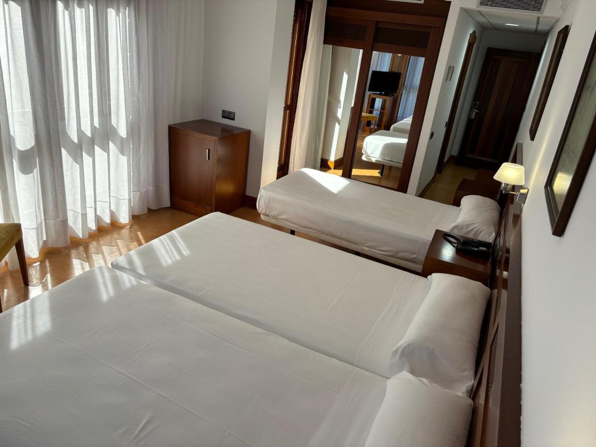 Cama o camas de una habitación en Gran Hotel Liber & Spa Playa Golf