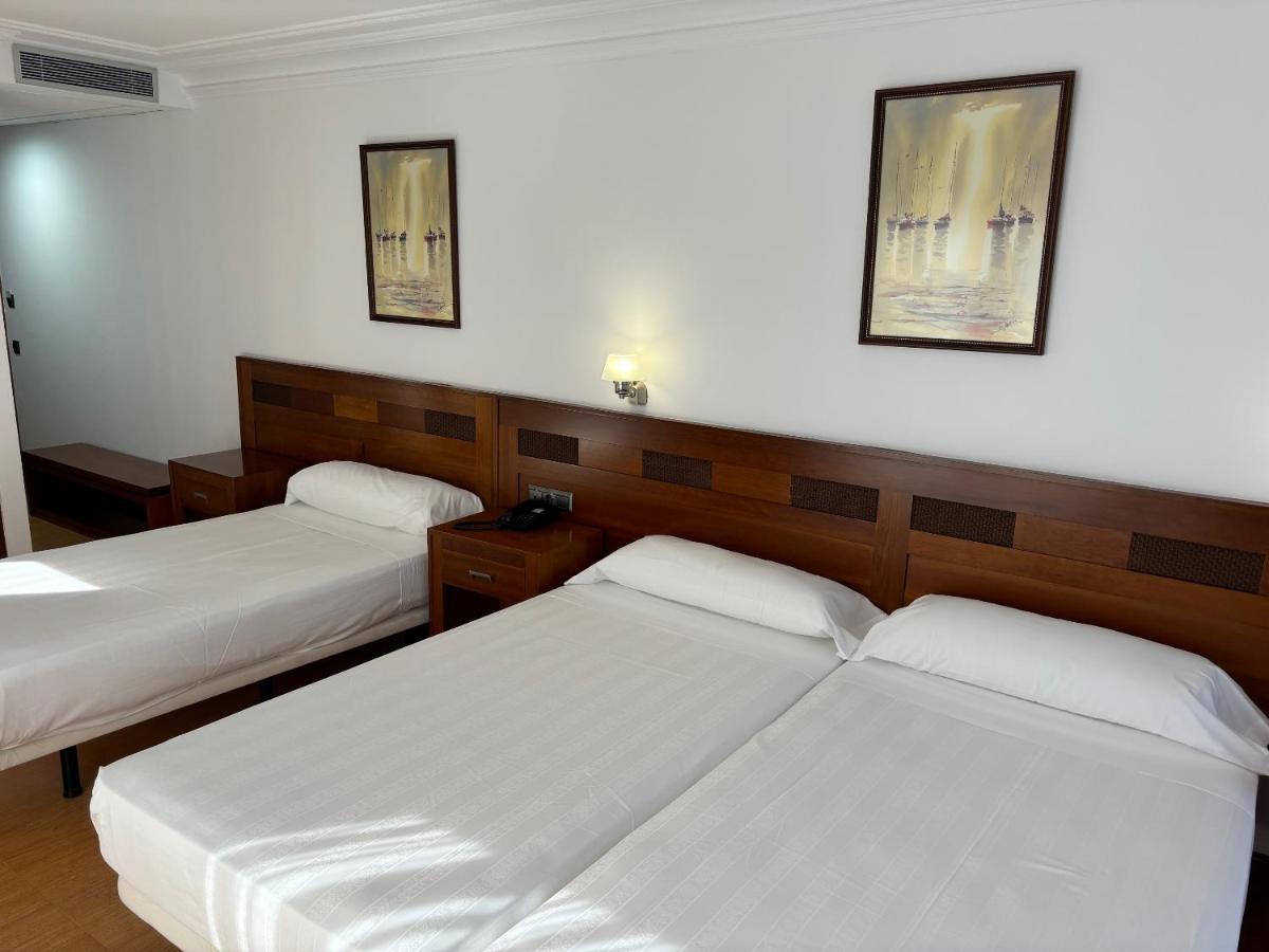 Cama o camas de una habitación en Gran Hotel Liber & Spa Playa Golf