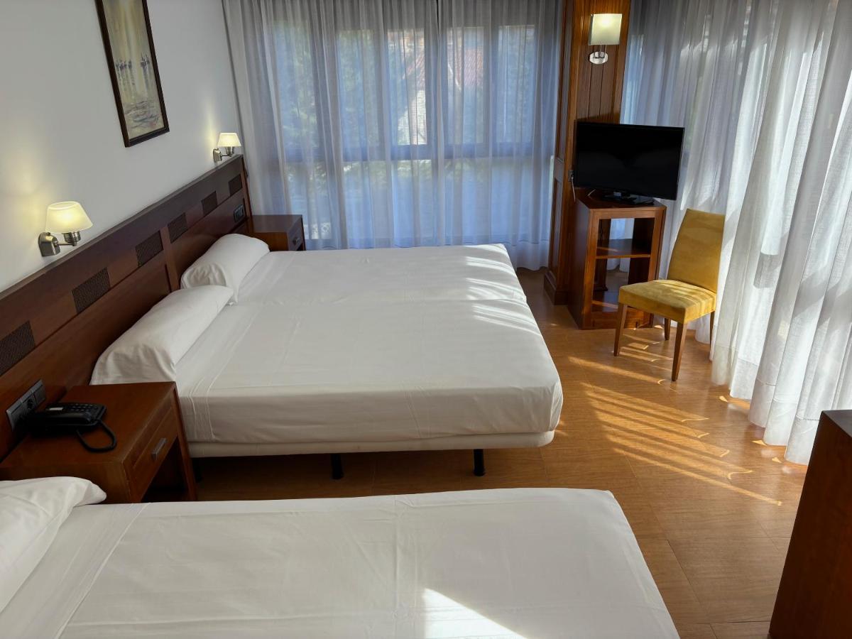 Cama o camas de una habitación en Gran Hotel Liber & Spa Playa Golf