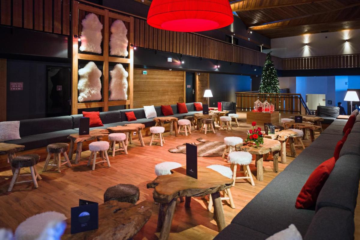 Coin salon dans l'établissement Marmotel & Spa