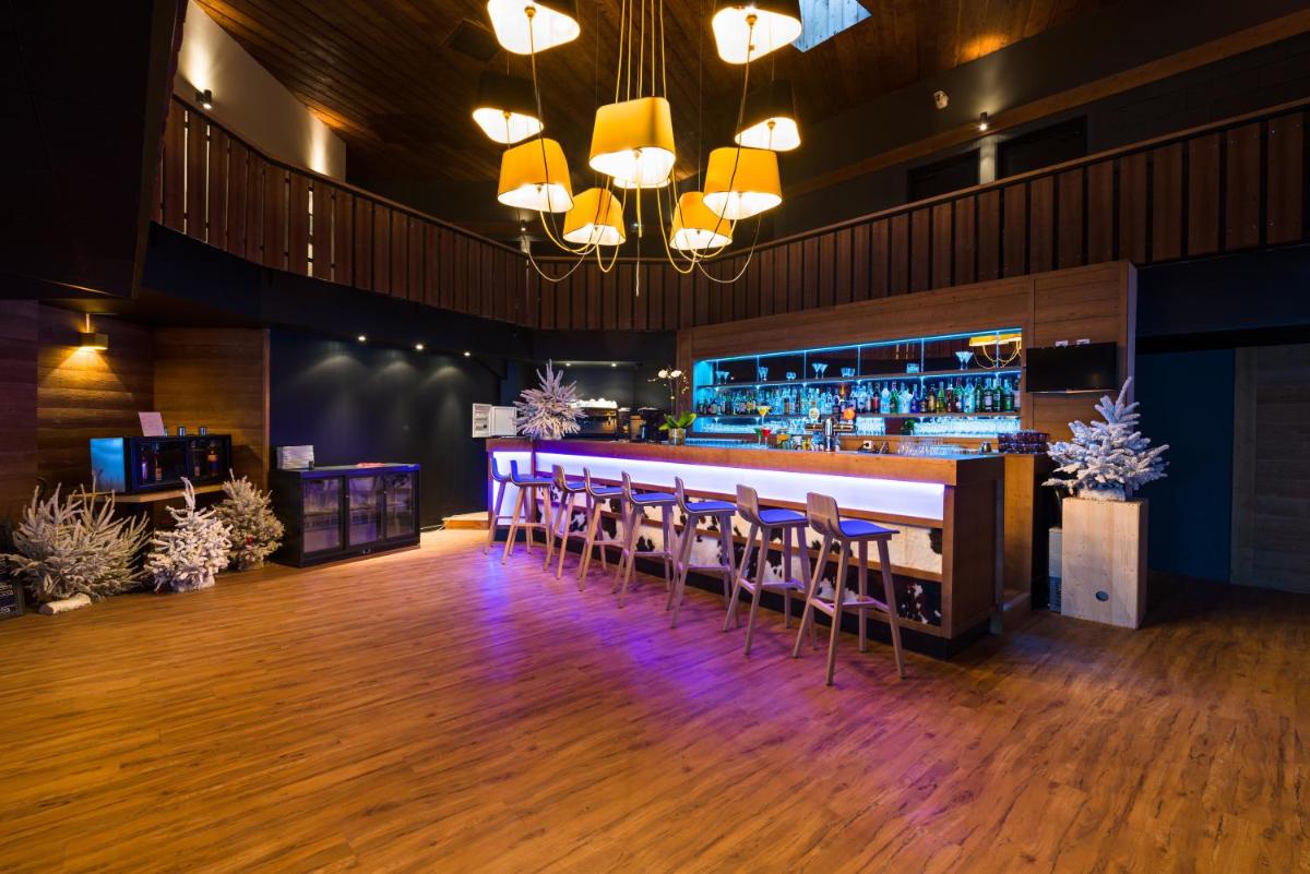 Restaurant ou autre lieu de restauration dans l'établissement Marmotel & Spa