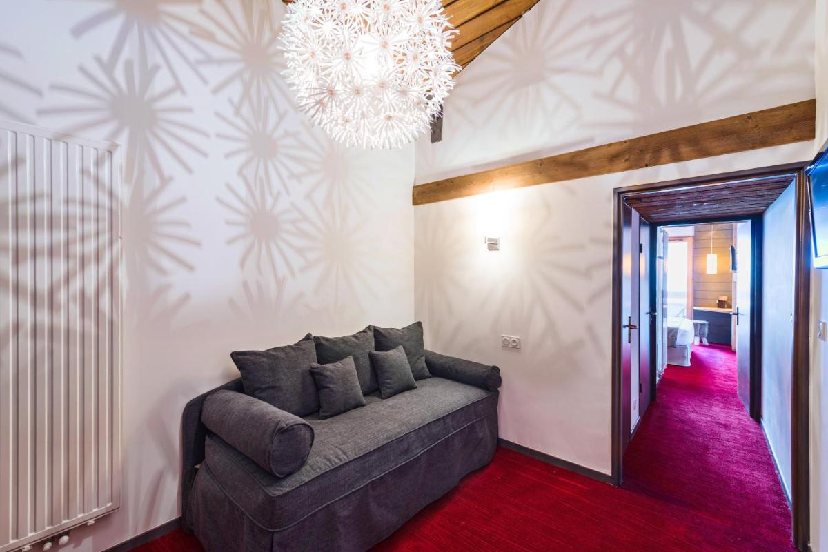Coin salon dans l'établissement Marmotel & Spa