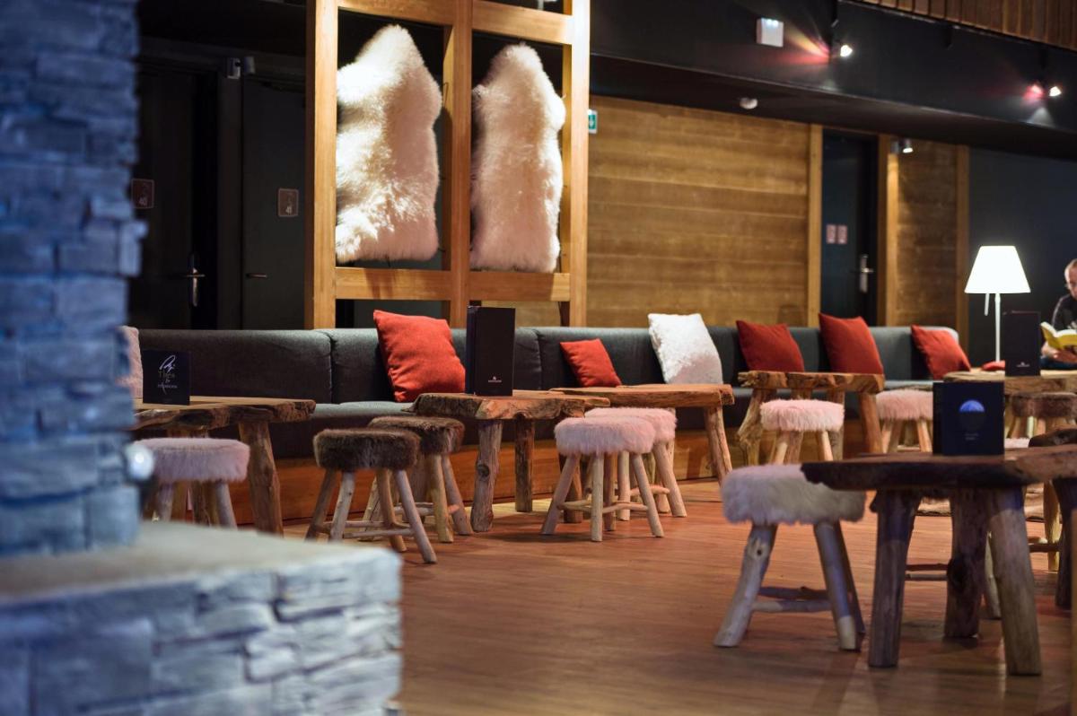 Coin salon dans l'établissement Marmotel & Spa