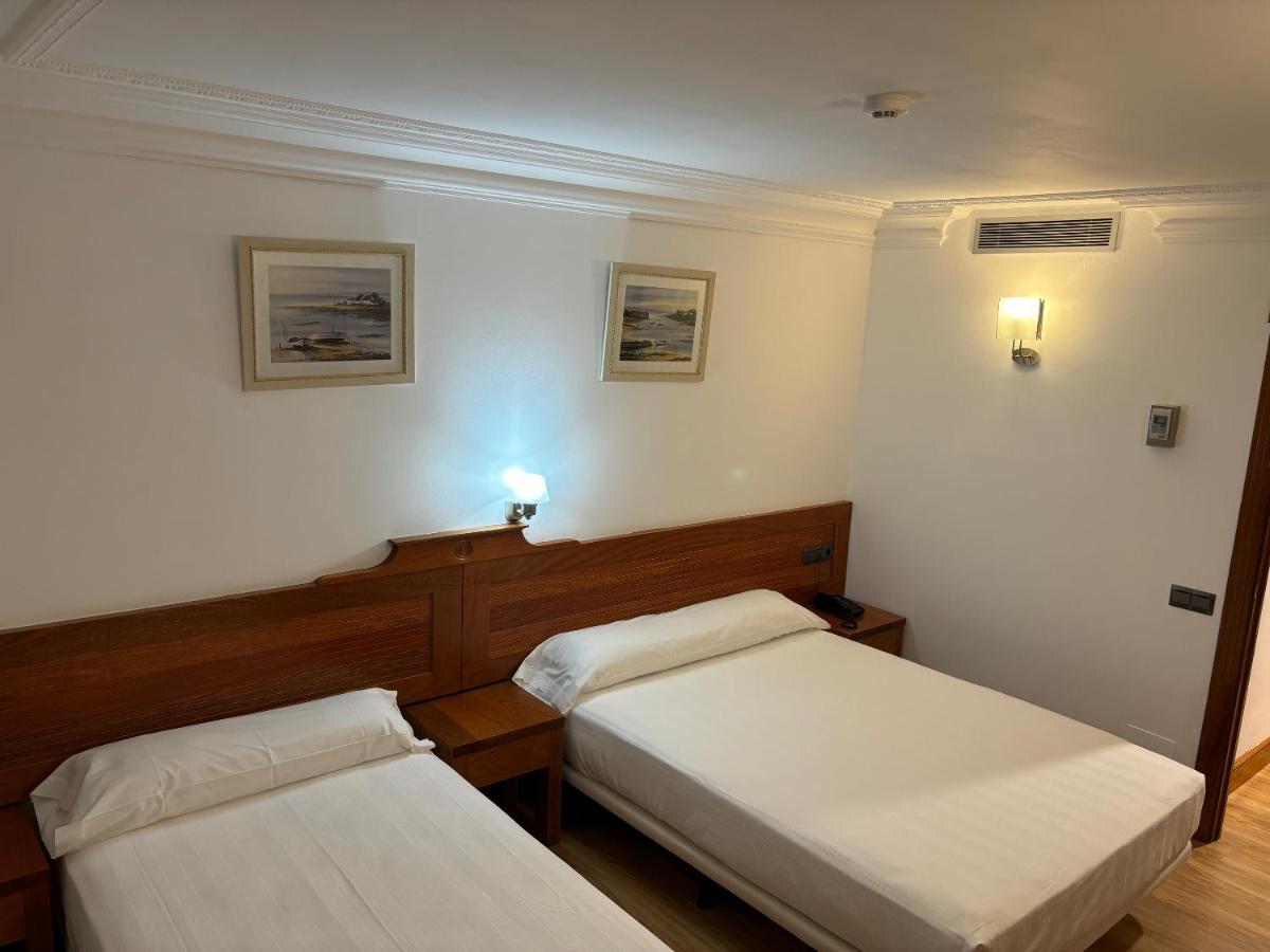 Cama o camas de una habitación en Gran Hotel Liber & Spa Playa Golf