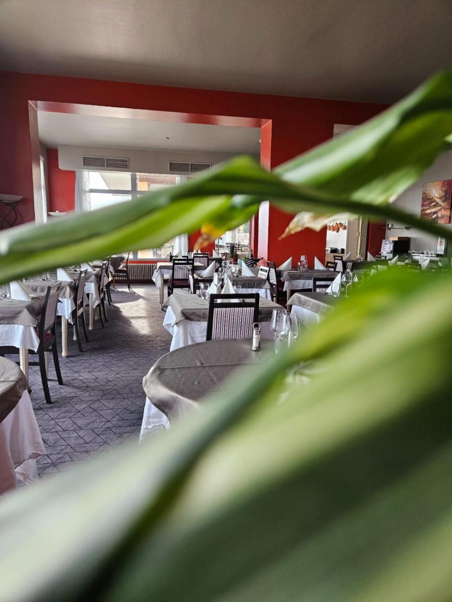 Coin salon dans l'établissement Alexain Hotel Restaurant & Wellness - Colmar Ouest