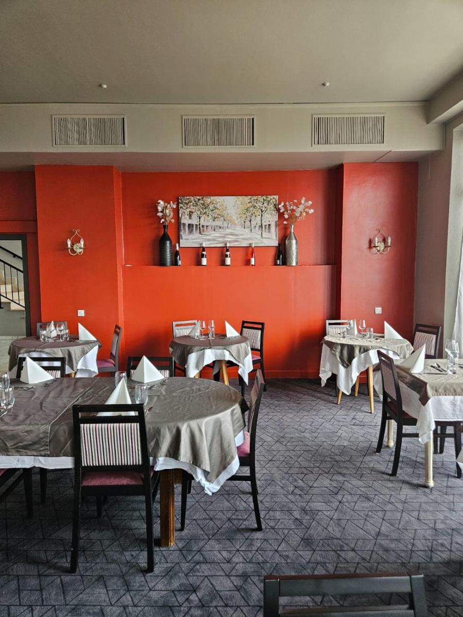 Coin salon dans l'établissement Alexain Hotel Restaurant & Wellness - Colmar Ouest