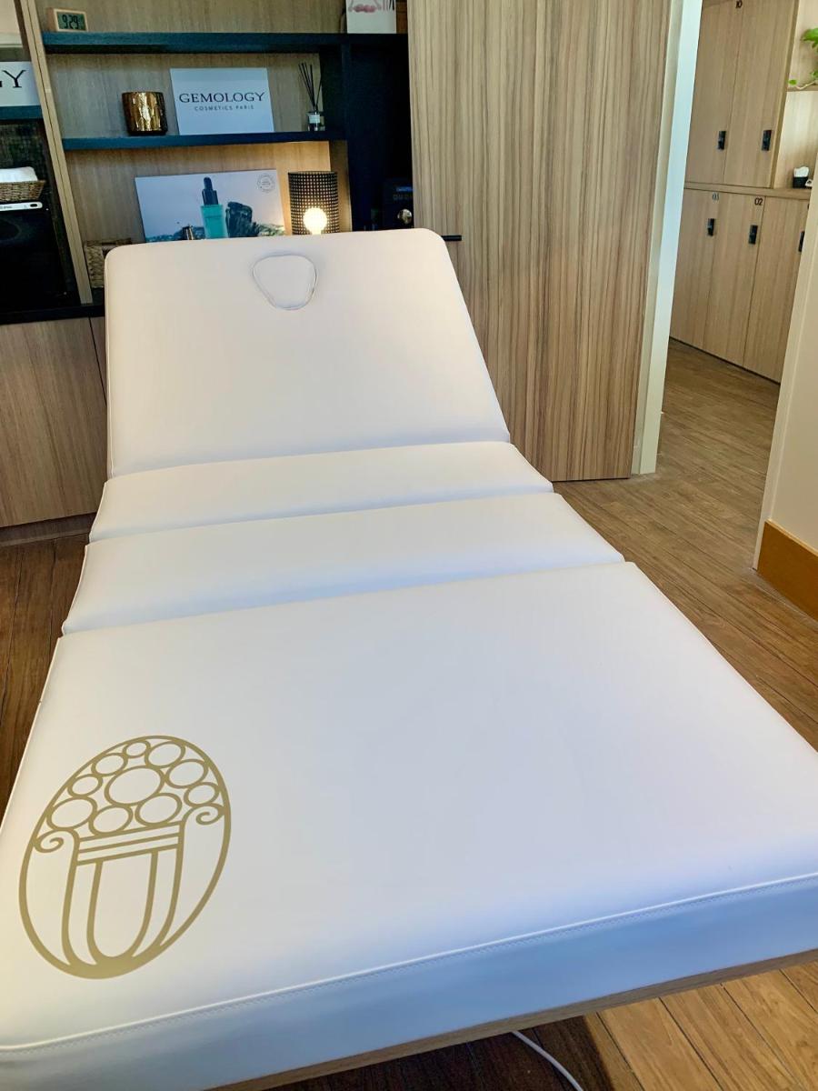 Un ou plusieurs lits dans un hébergement de l'établissement Splendid Hôtel & Spa