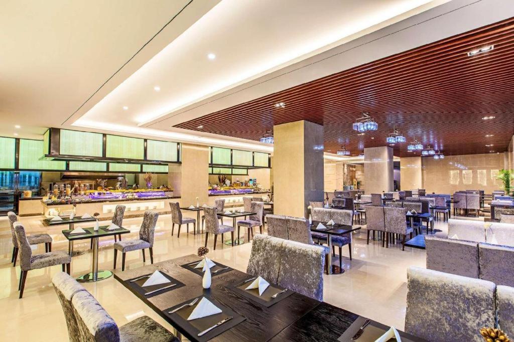 Ramada by Wyndham Taixing - Housity