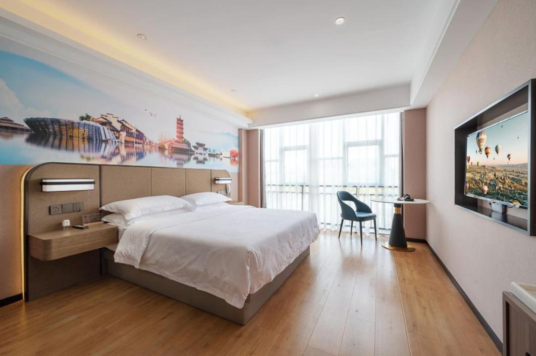 Kaiyuan Yiju Hotel - Jiaxing Nanhu Babaihan Branch - Housity