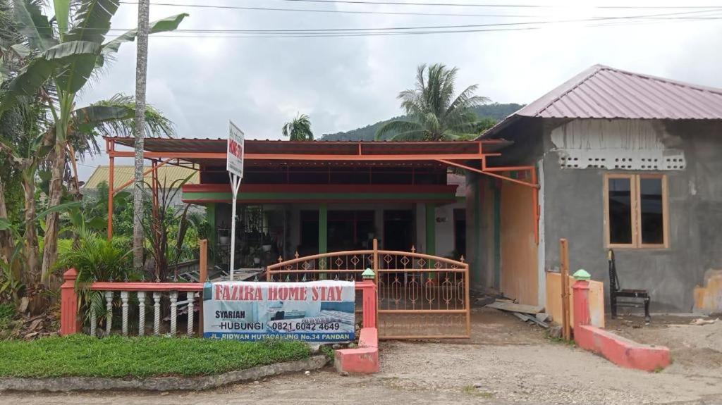 EXPRESS O 91477 Fazira Home Stay Syariah - Housity