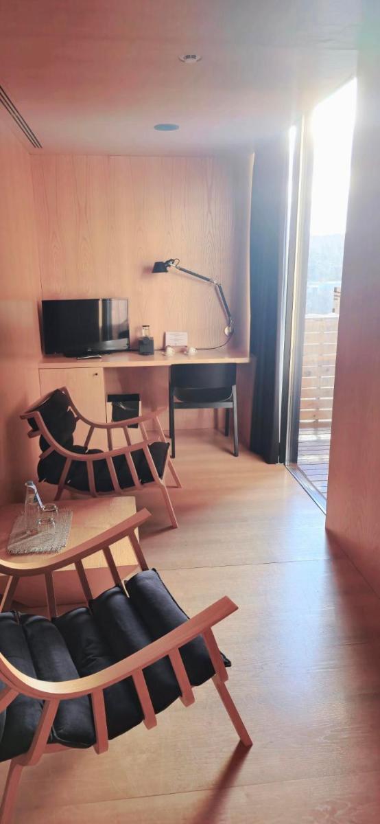 Uma área de estar em Cró Hotel Rural