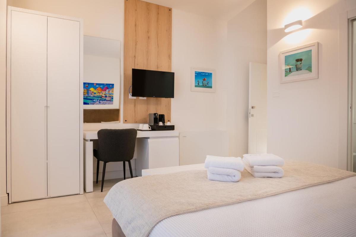 Lo Studio di viale Lo Re camere & caffe’ - Housity