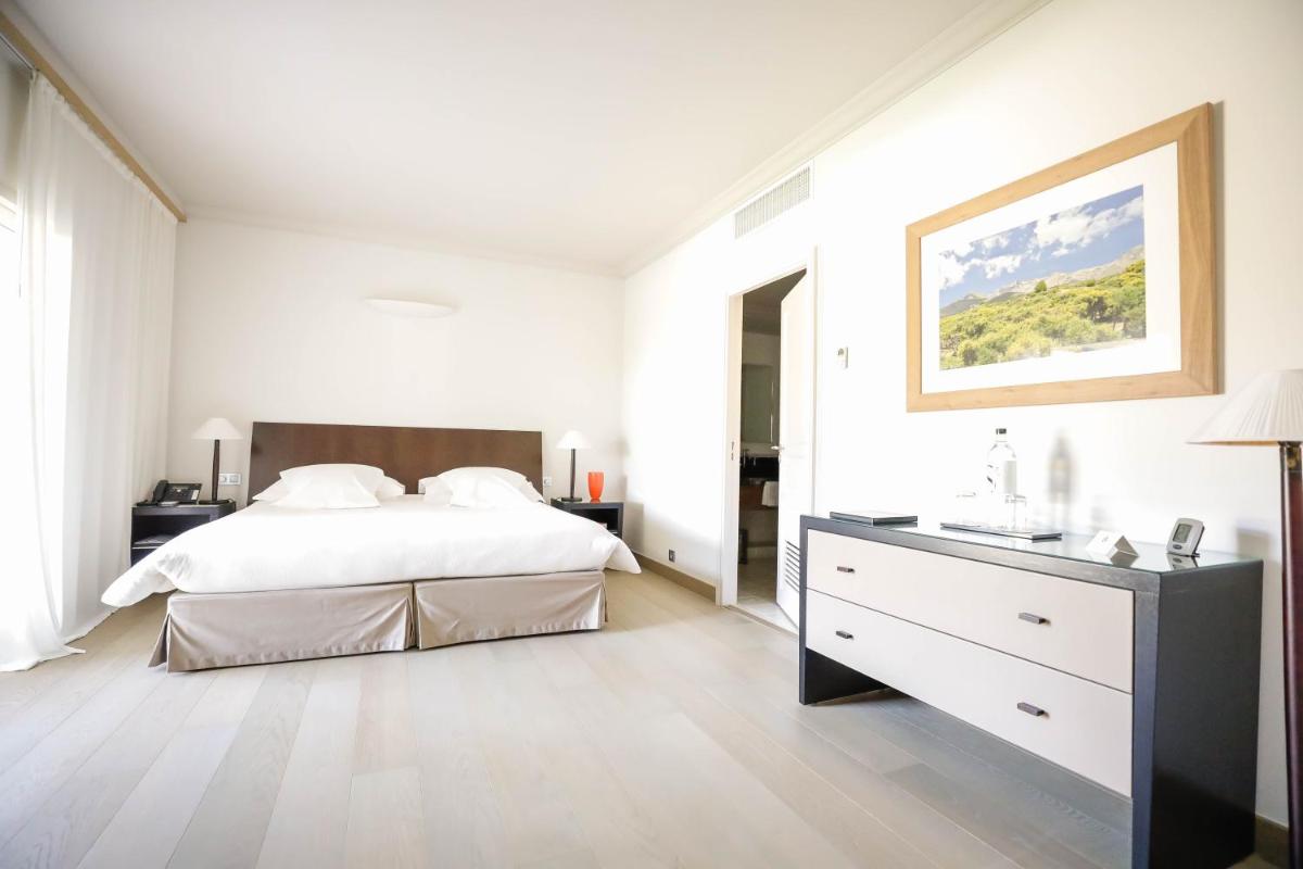 Un ou plusieurs lits dans un hébergement de l'établissement La Villa Calvi