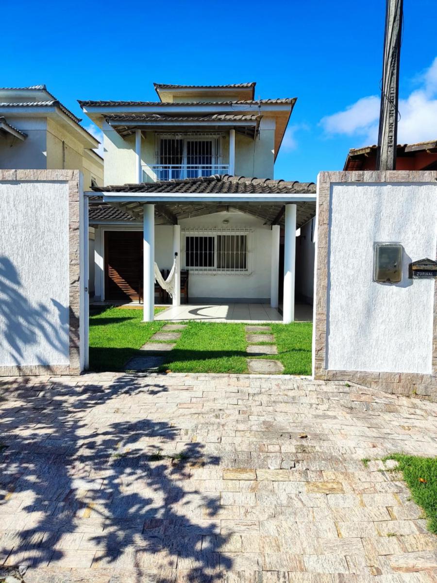 Casa Piscina em Condomínio 5min Praia ITACOATIARA. - Housity
