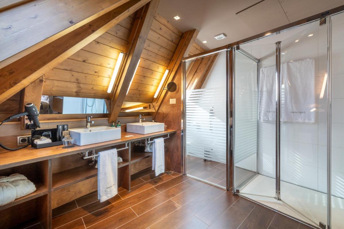 Un baño de Hotel Val de Neu G.L.