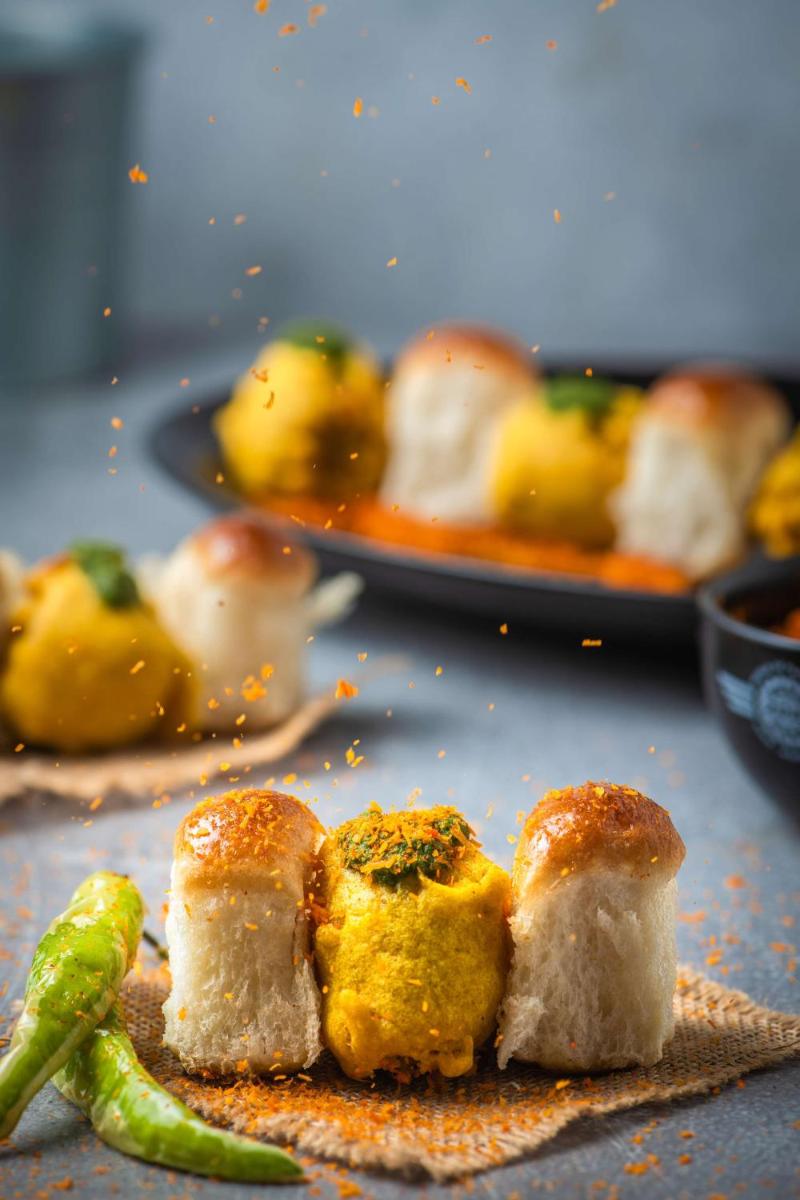 a plate of food with sushi on a table at Hyatt Place Hyderabad Banjara Hills in Hyderabad