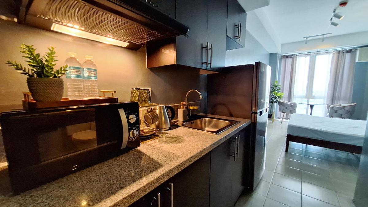 The French Apartment Pasig - Fast Wi-Fi and pool - Housity
