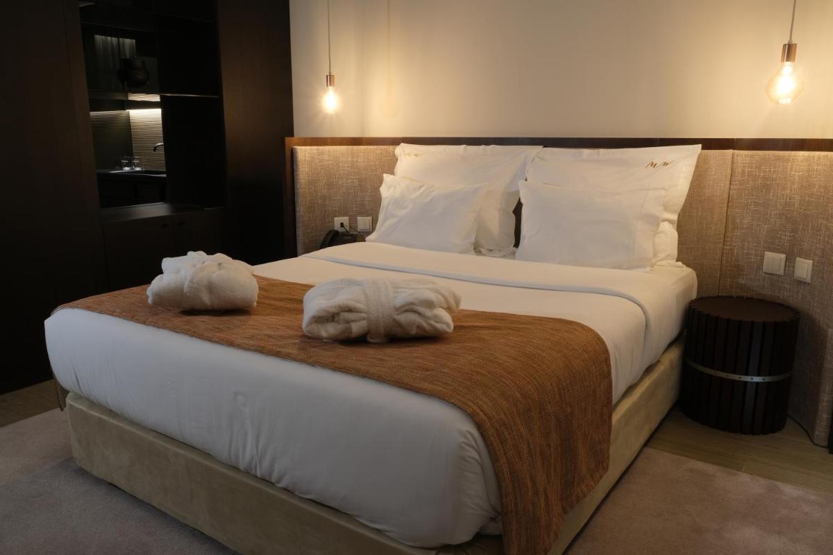 Uma cama ou camas num quarto em MW Douro Wine & Spa
