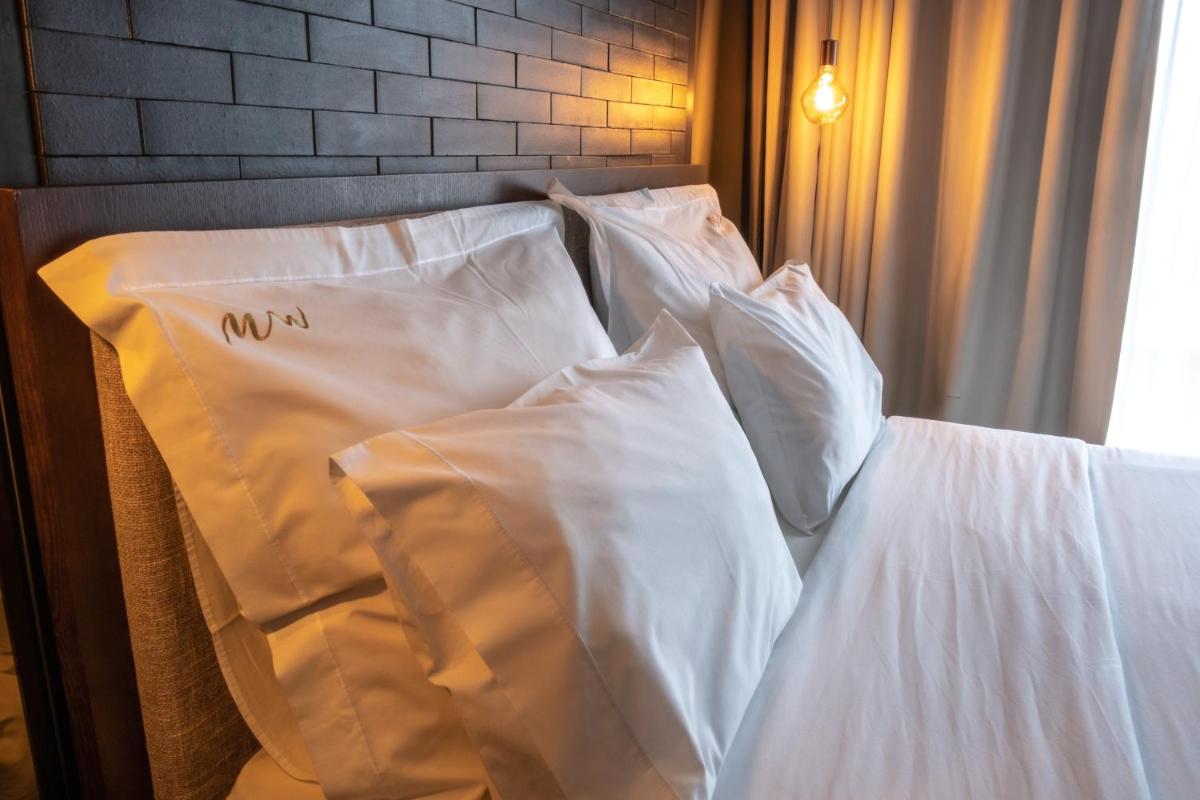 Uma cama ou camas num quarto em MW Douro Wine & Spa
