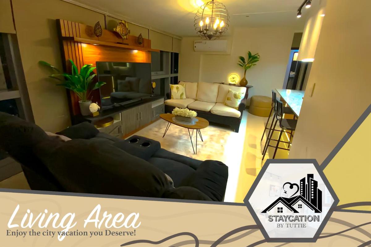 Luxurious 2 Bedroom Family Suite plus Maid Rm in Eastwood City - Housity