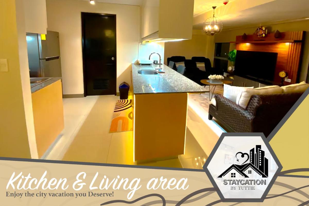 Luxurious 2 Bedroom Family Suite plus Maid Rm in Eastwood City - Housity