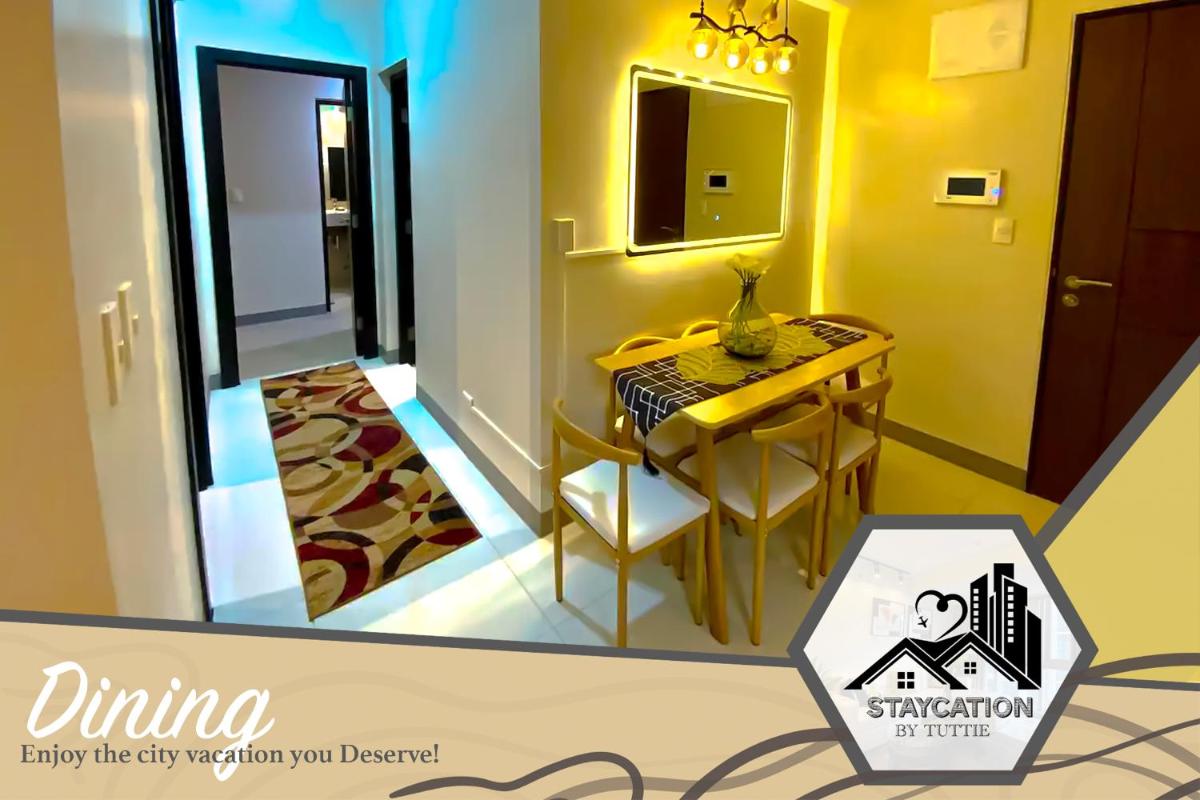 Luxurious 2 Bedroom Family Suite plus Maid Rm in Eastwood City - Housity