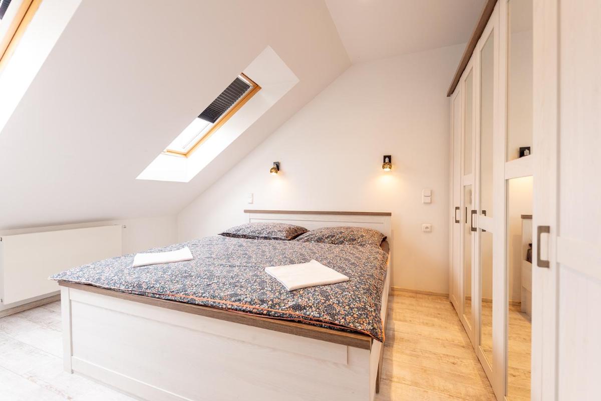 Apartmány Holiday - Housity