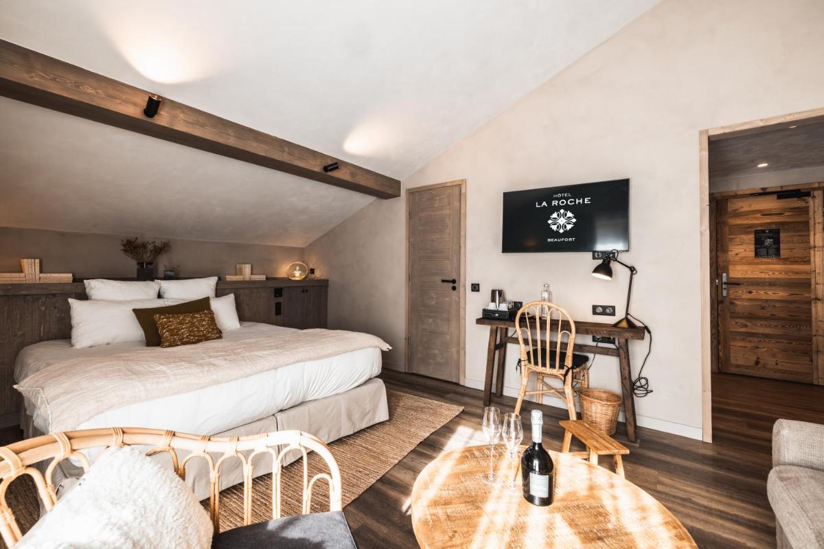 Télévision ou salle de divertissement dans l'établissement Hôtel de la Roche